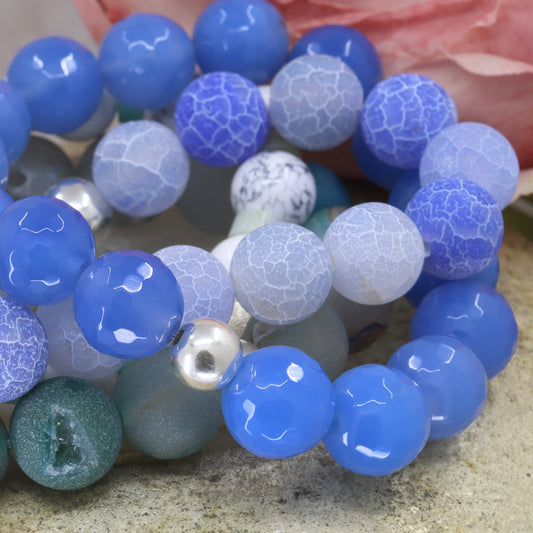 Multicolored beaded bracelet on a textured surface