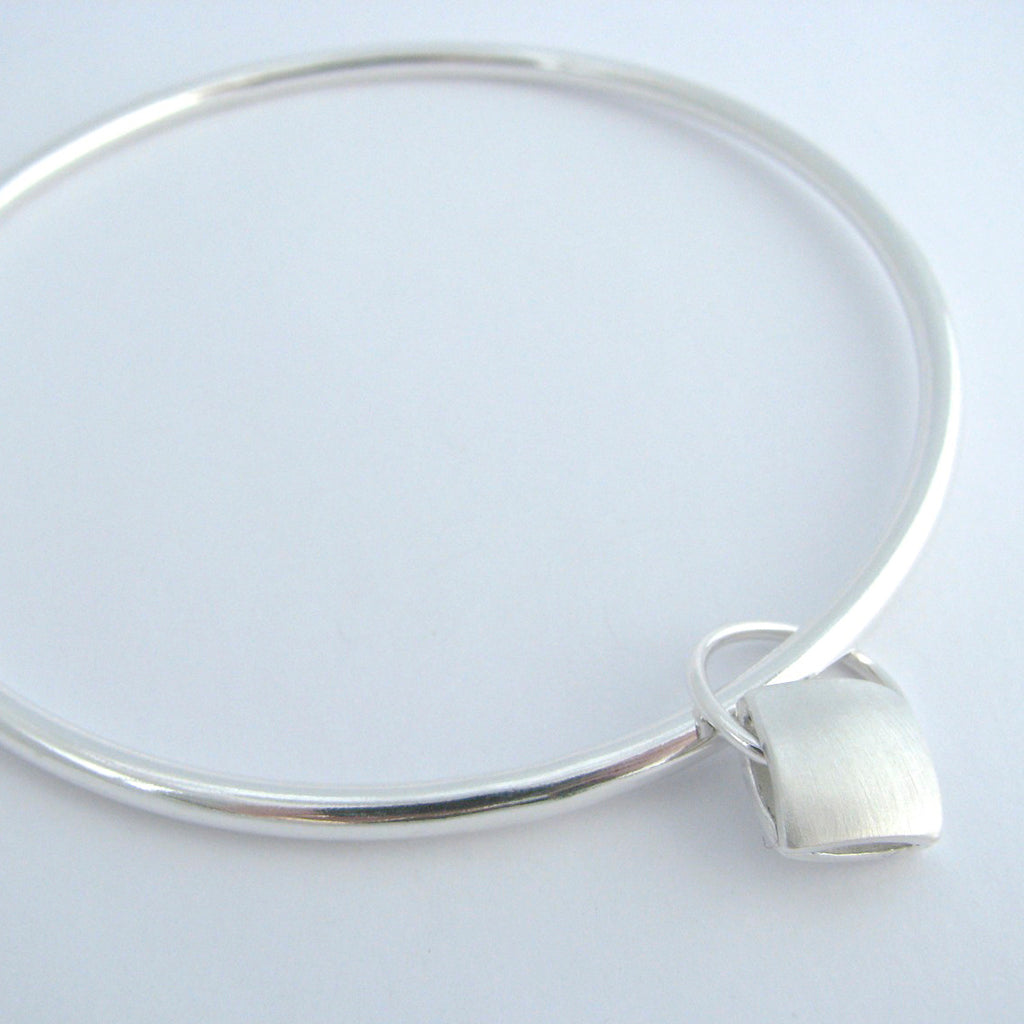 Revere Cushion Silver Charm Bangle