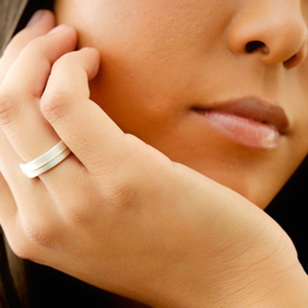 Silve & Gold Lines ring shown on model